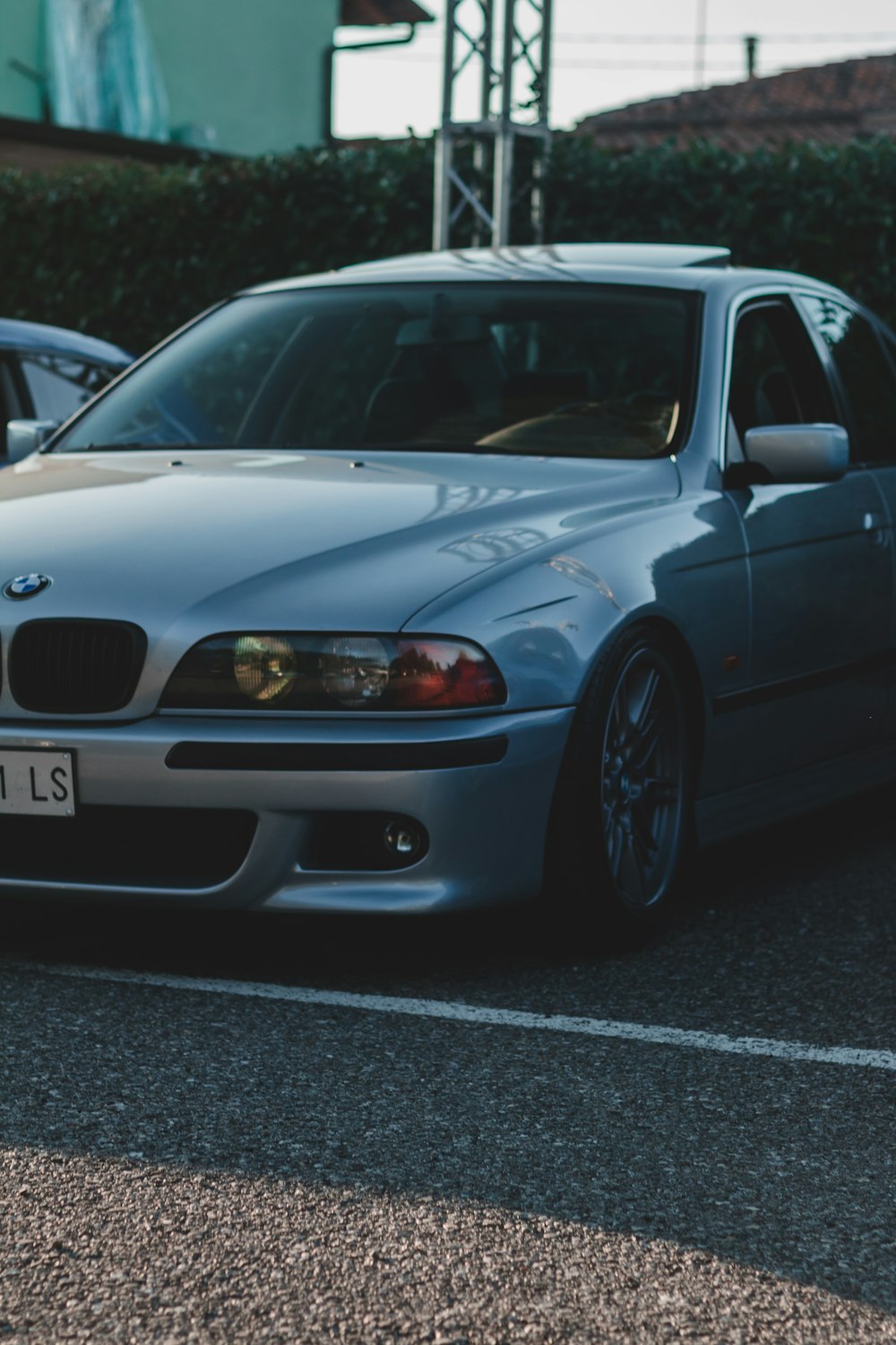 white bmw m 3 coupe on road during daytime