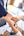 person in black long sleeve shirt holding persons hand