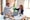 man in white dress shirt sitting beside woman in black long sleeve shirt