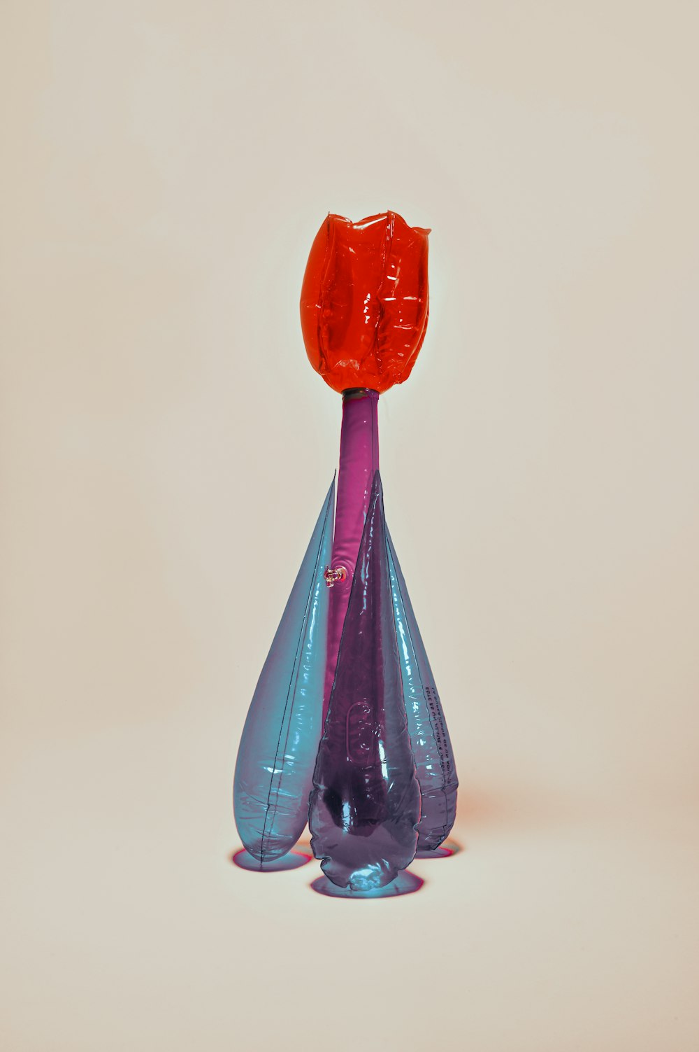 red and blue glass bottle
