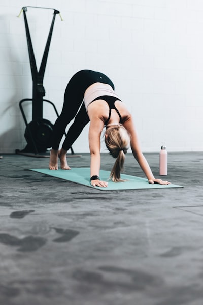 Relieve stress and tension by doing downward facing dog