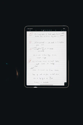 A person holding a tablet showing a protocol page with step-by-step health routines.