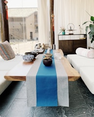 Cozy tea house interior with wooden tables and fresh fruit juices served.