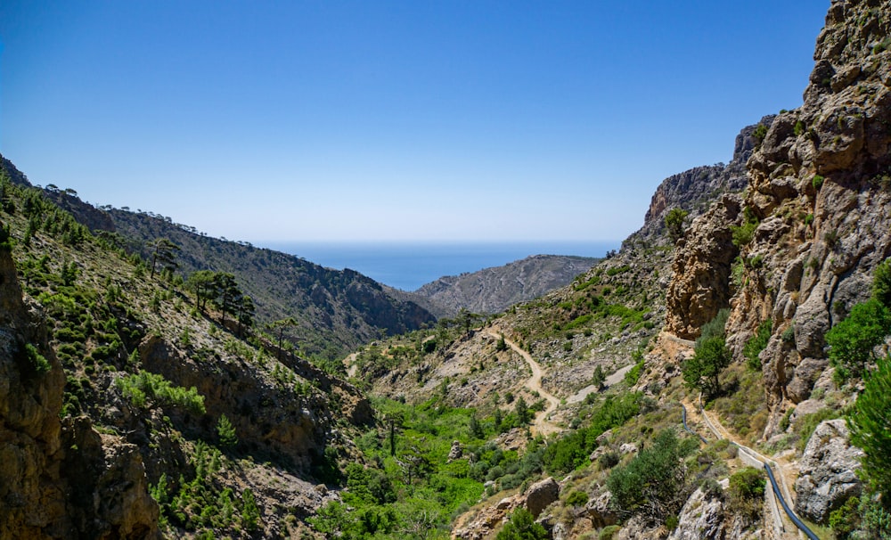 green and brown mountains under blue sky during daytime