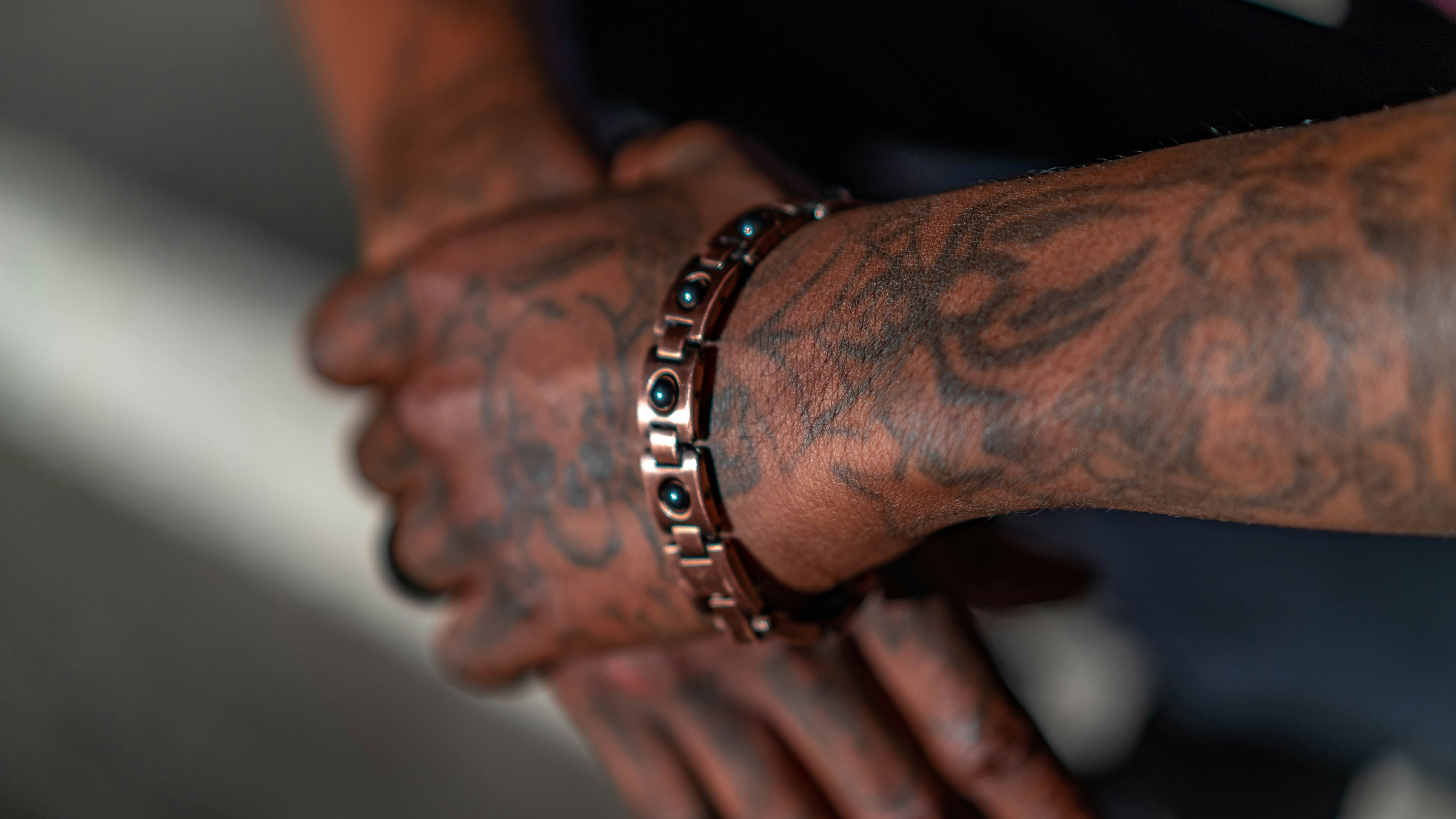 person wearing silver and diamond ring