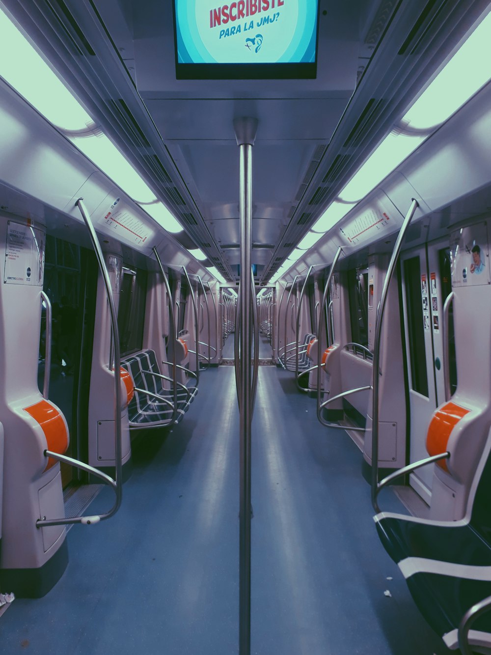 white and orange train seats