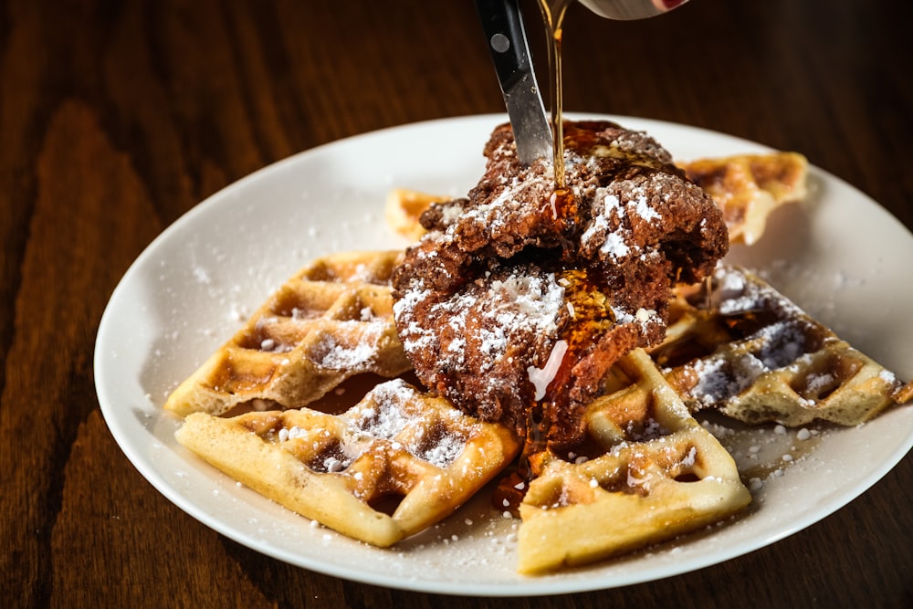 pasta with chocolate syrup on white ceramic plate