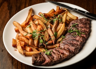 grilled meat on white ceramic plate