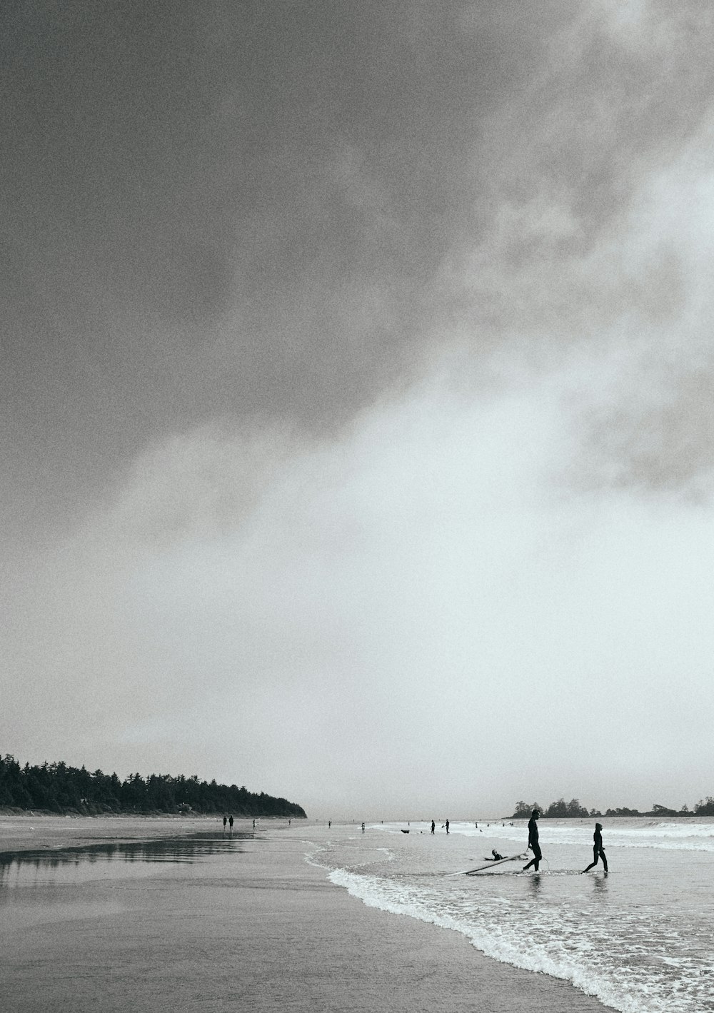 body of water under white sky