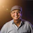 man in white button up shirt wearing gray knit cap