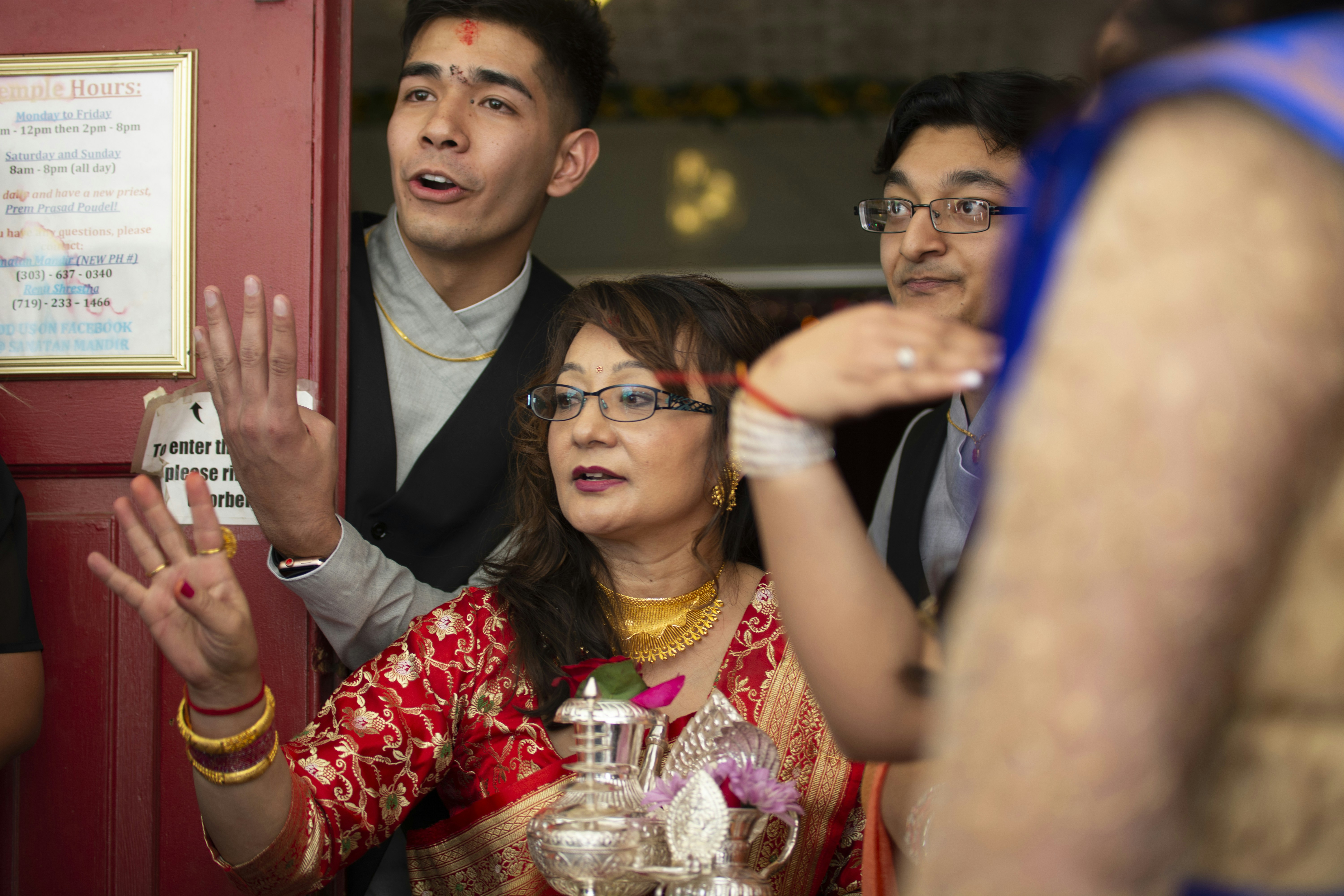 Woman in red and white floral dress