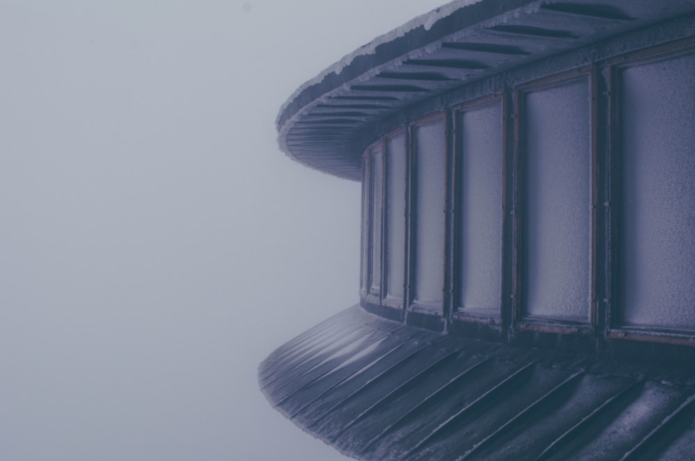 black spiral staircase with white background