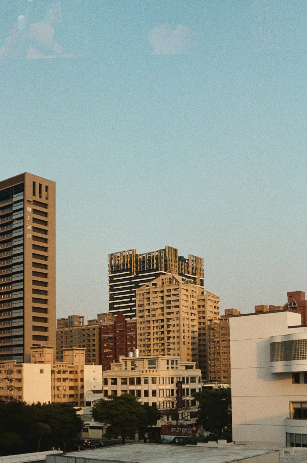 brown and white concrete building during daytime