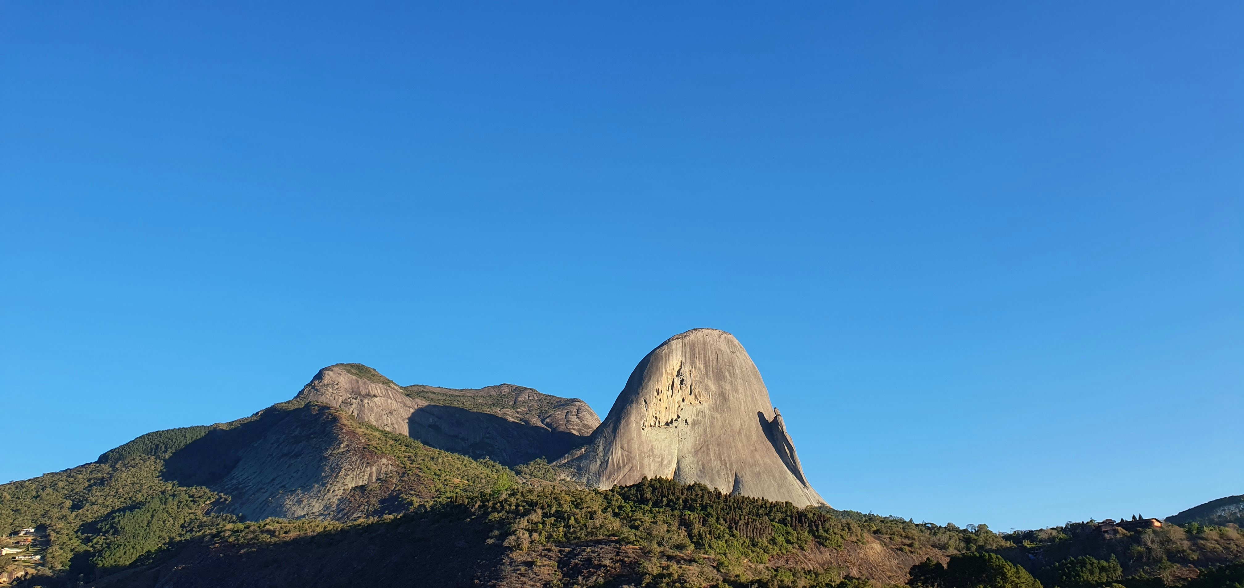 brown mountain under blue sky during daytime