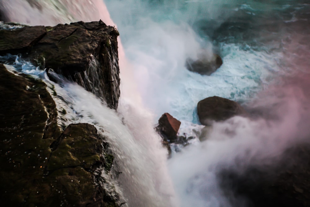 water falls on rocky mountain