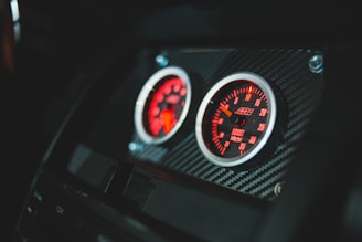 black and gray car speedometer