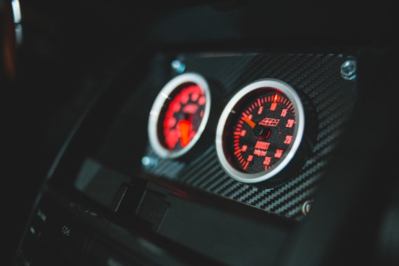 black and gray car speedometer