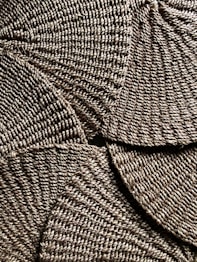 brown and white woven textile