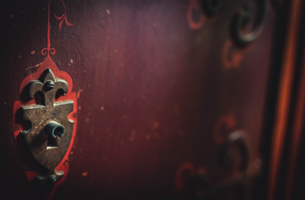 red and silver steel door handle