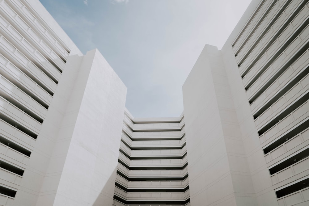 white concrete building under blue sky during daytime