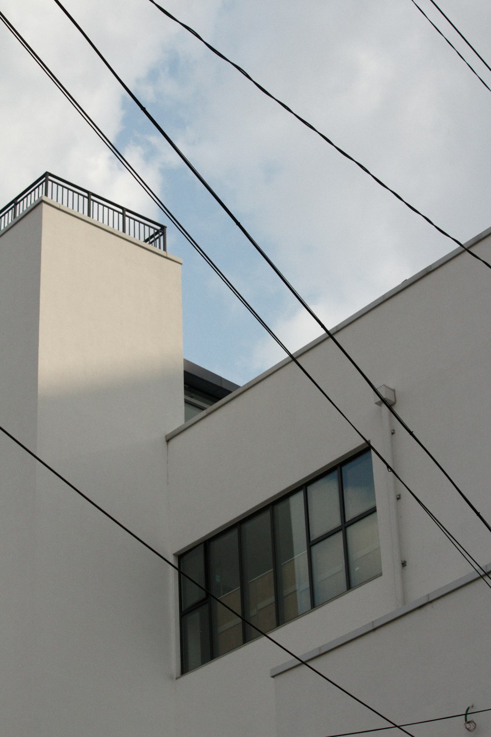 white concrete building under blue sky during daytime