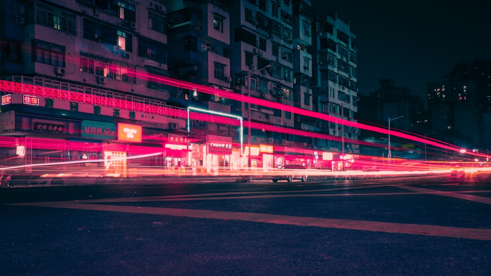 time lapse photography of cars on road during night time