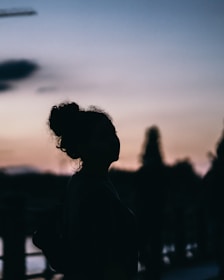 silhouette of woman during sunset