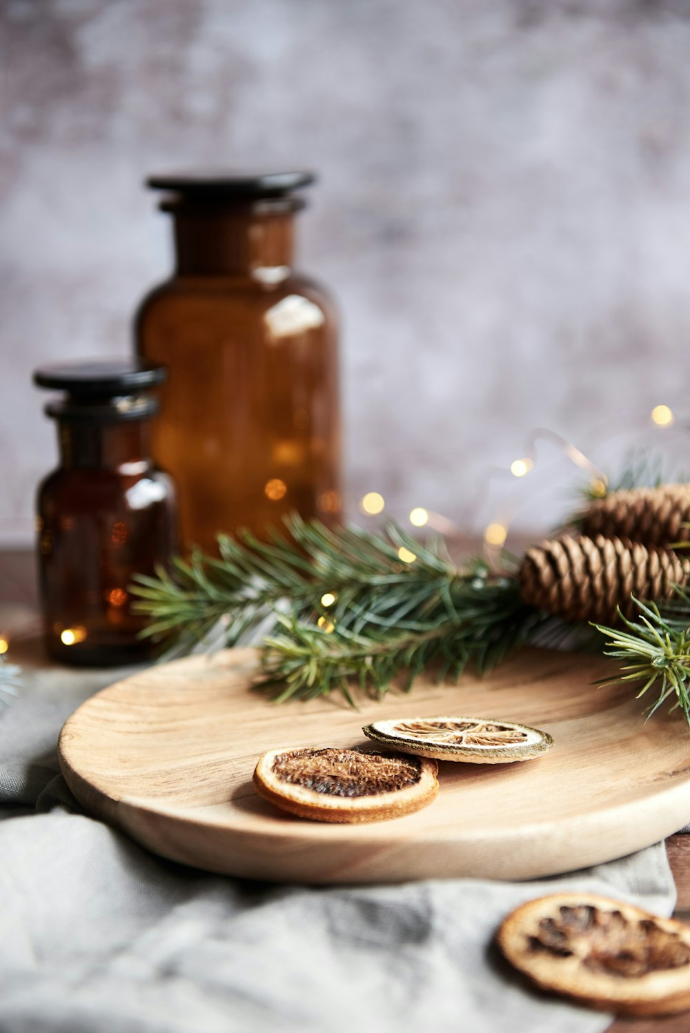 brown pine cone on brown wooden round tray