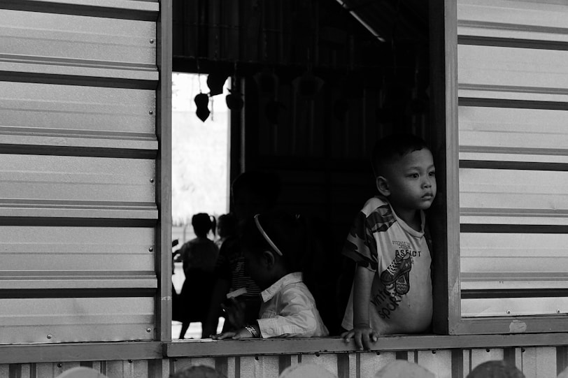 The Geographic Traveller: The Cambodian River That Becomes a Lake boy in floating village tonle sap