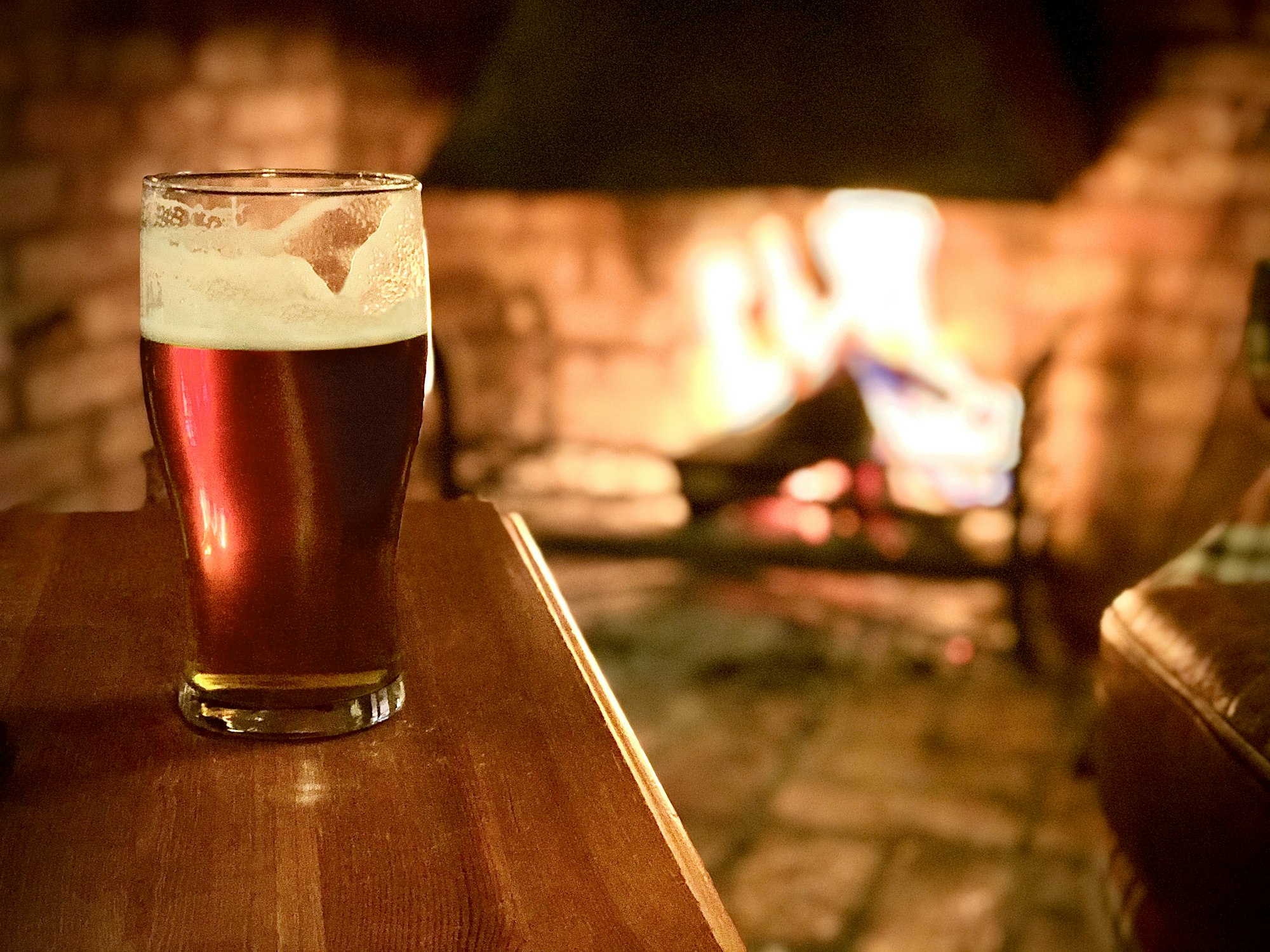 Beer by the pub fire. St Ives 2020