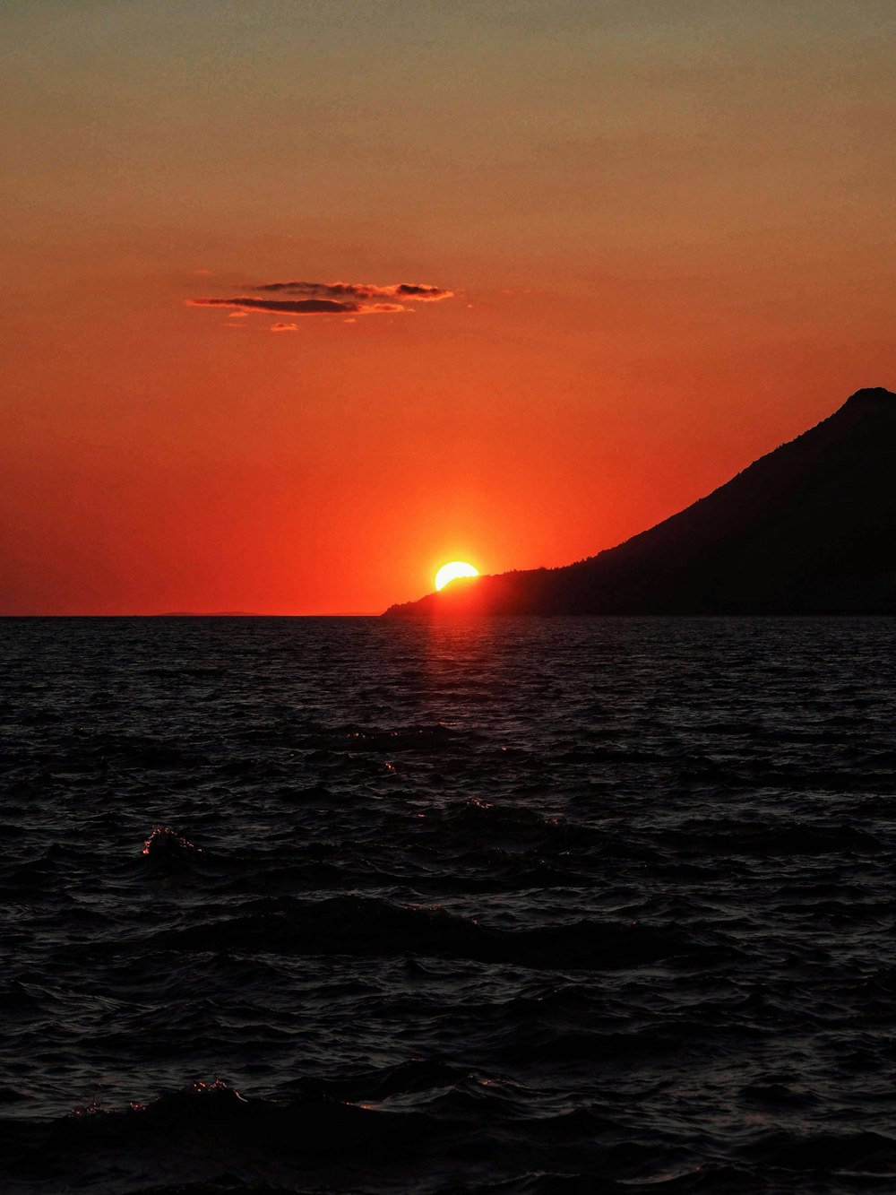 silhouette of mountain during sunset