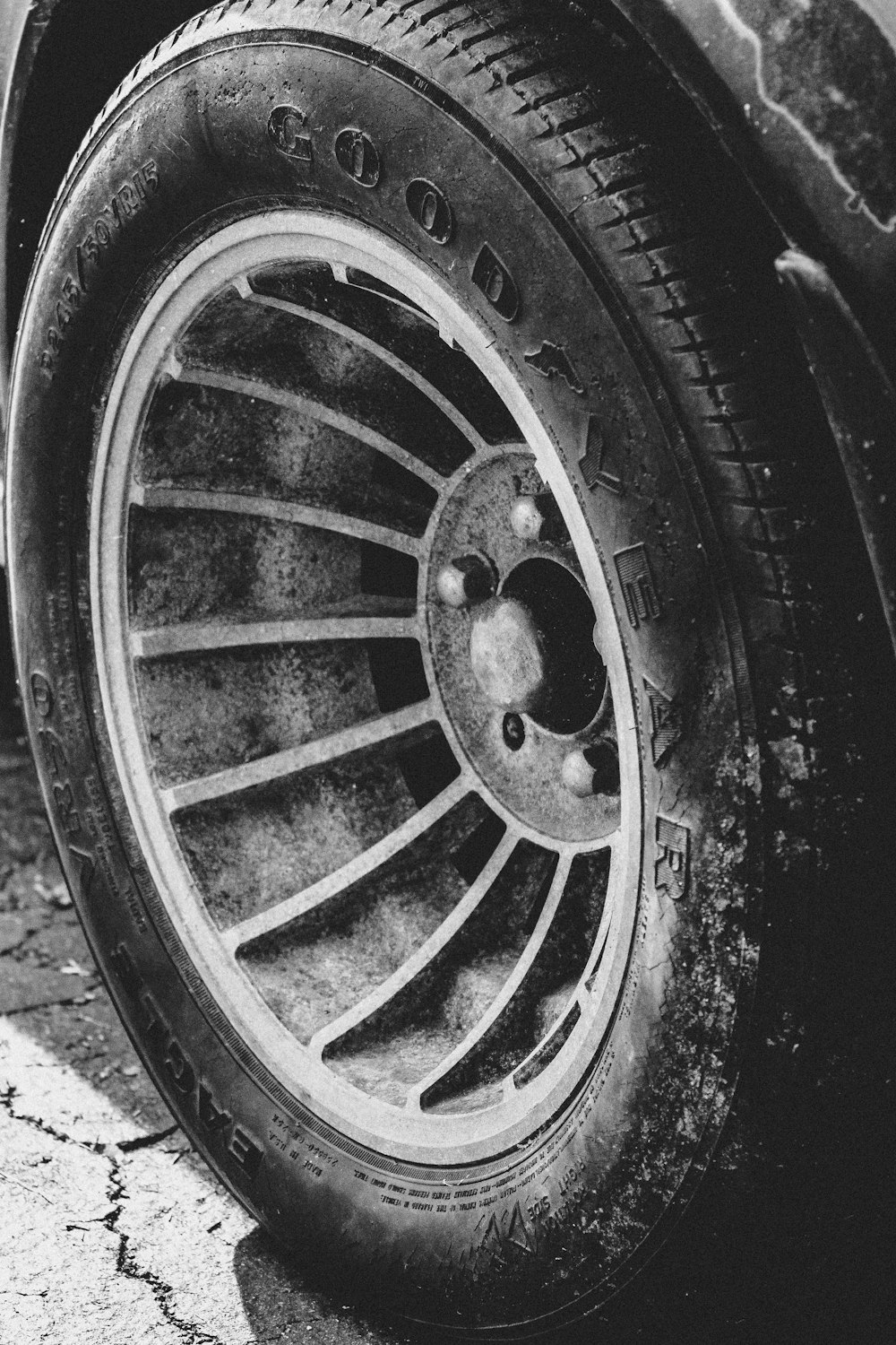 black and silver wheel on gray concrete floor