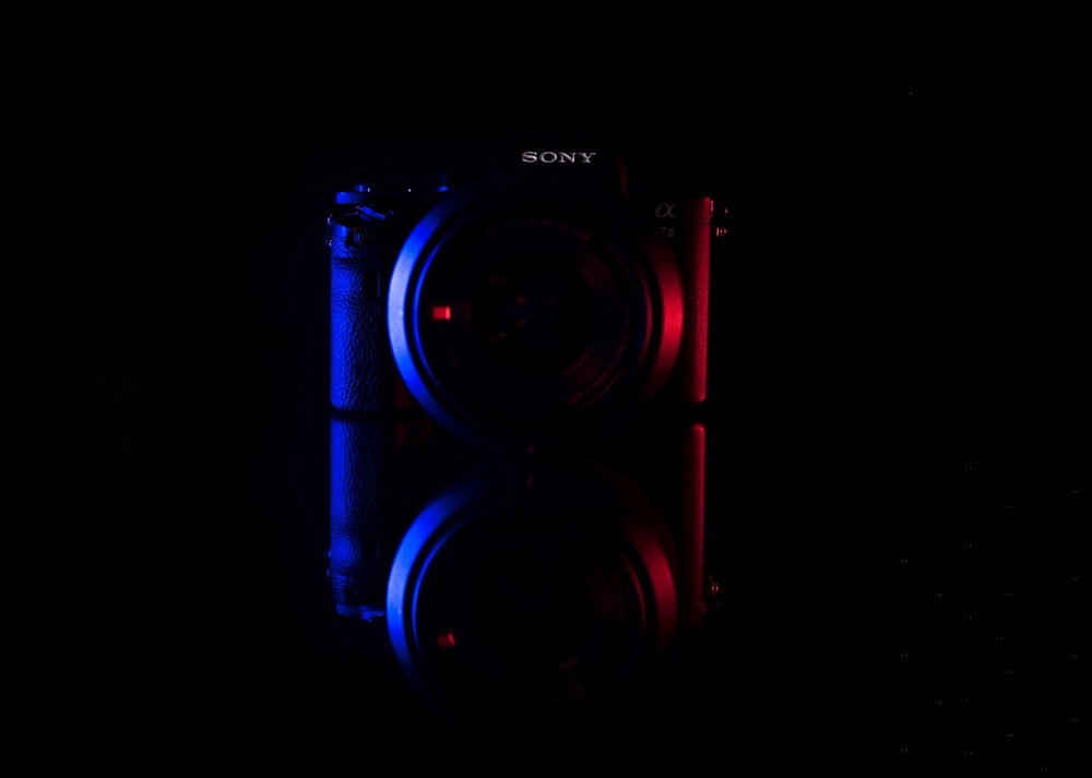 black sony camera with blue light