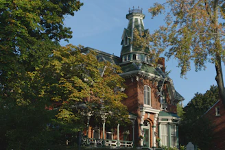 A beautifully restored family home bathed in golden sunlight, symbolizing hope and new beginnings.