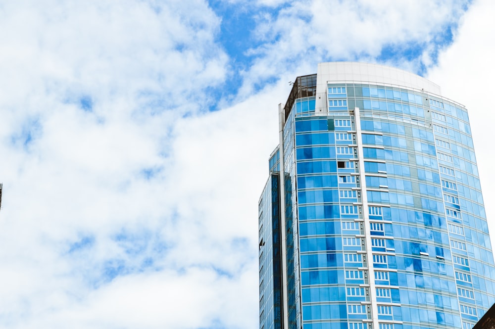 white and blue concrete building under blue sky during daytime