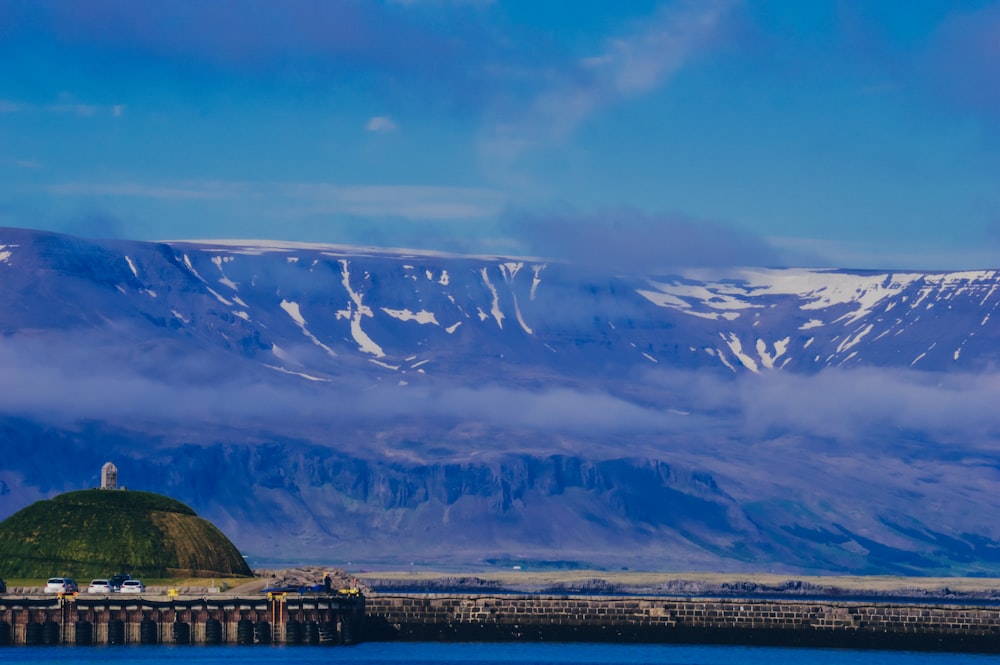 snow covered mountain under blue sky during daytime