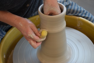 person holding white round ceramic bowl