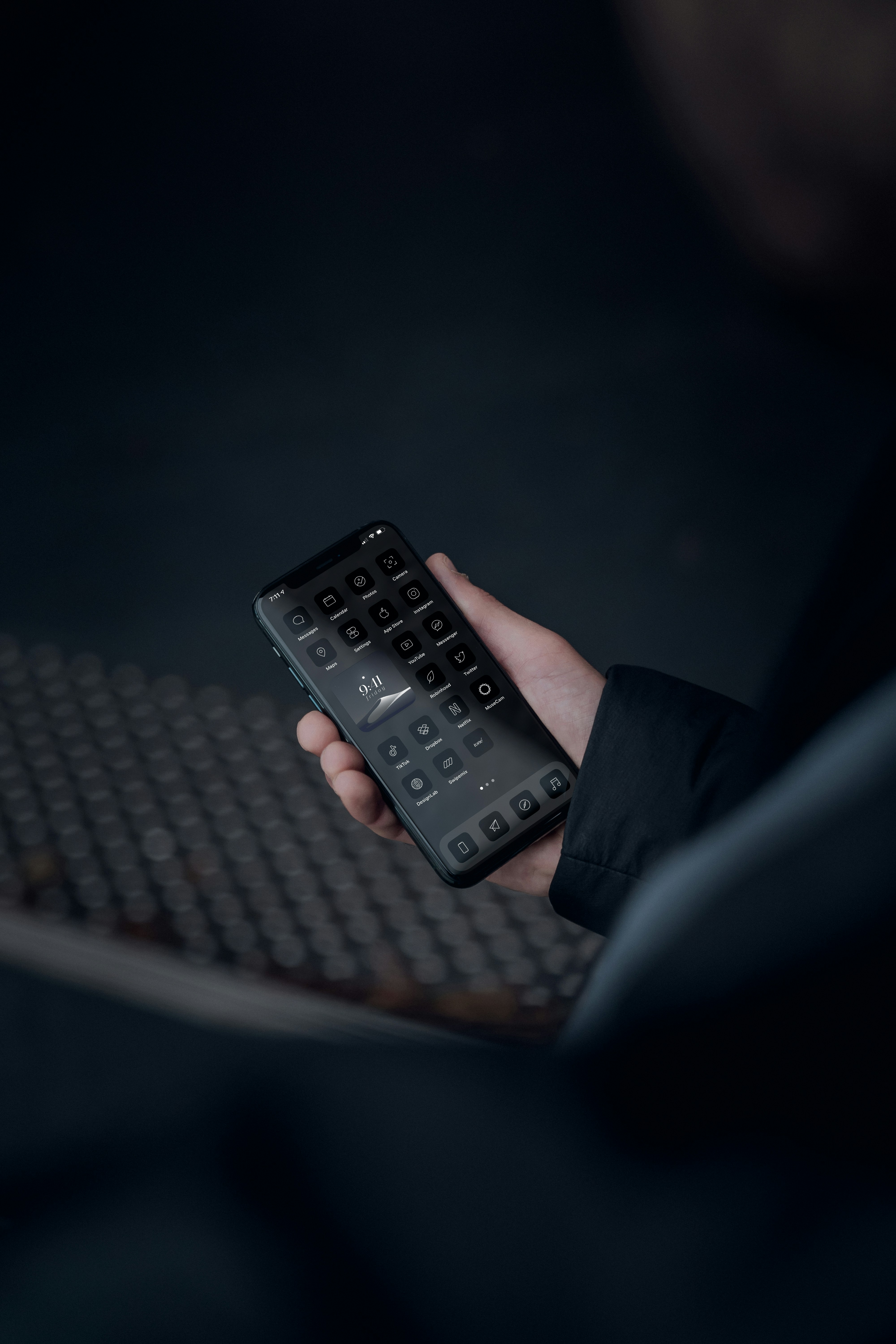 person holding black remote control