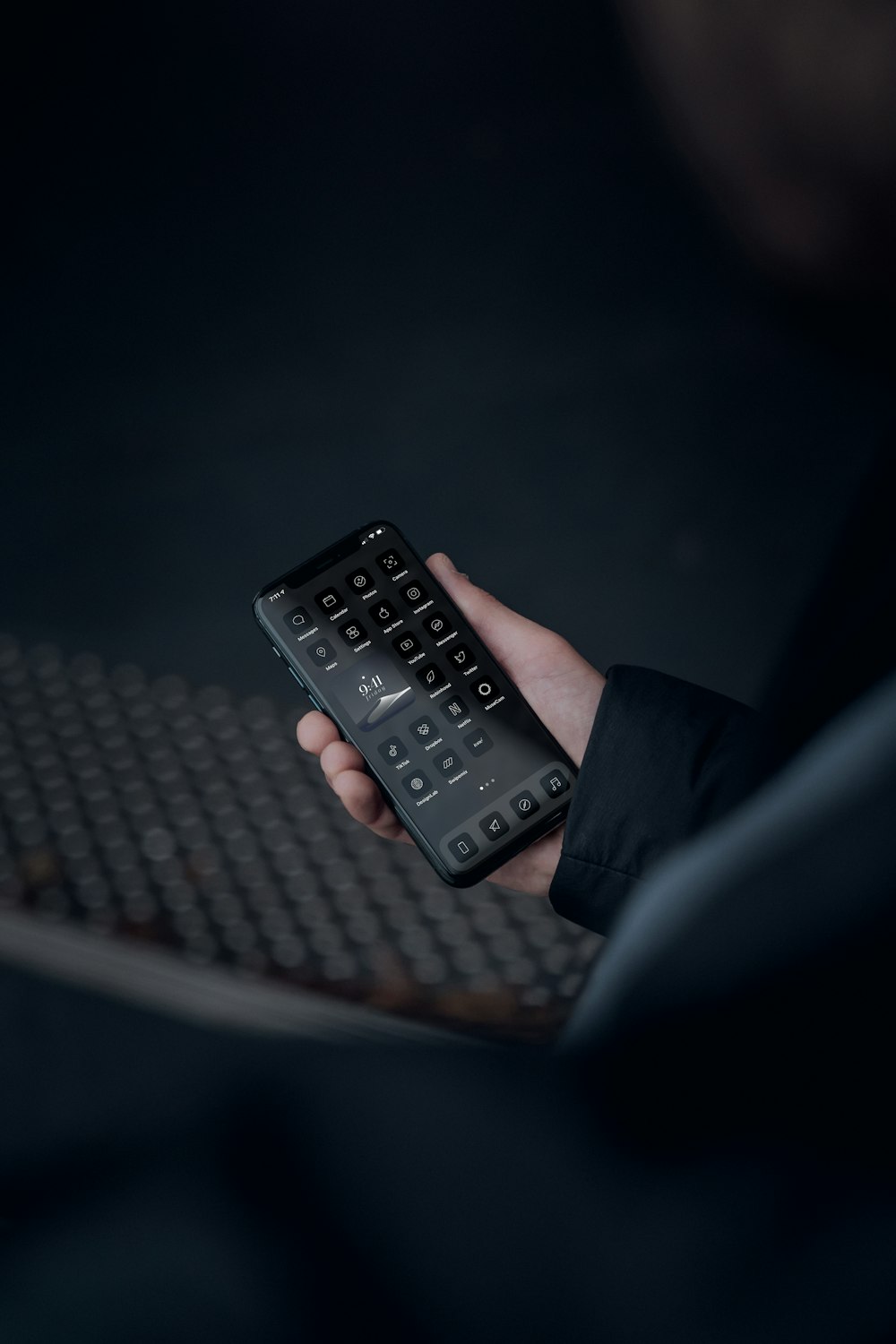 person holding black remote control