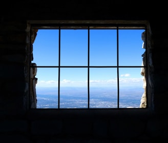 black metal window frame during daytime