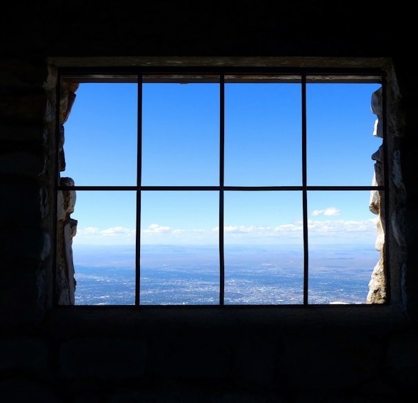 black metal window frame during daytime