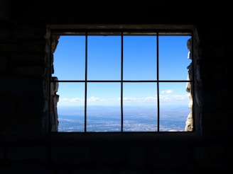 black metal window frame during daytime