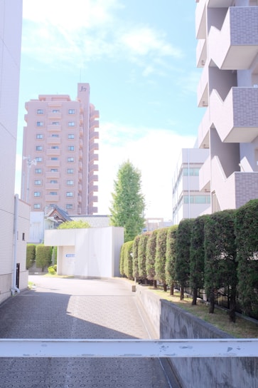 A vibrant montage showing outdoor cleaning in action, a well-kept residential building, and a confident financial advisor meeting.