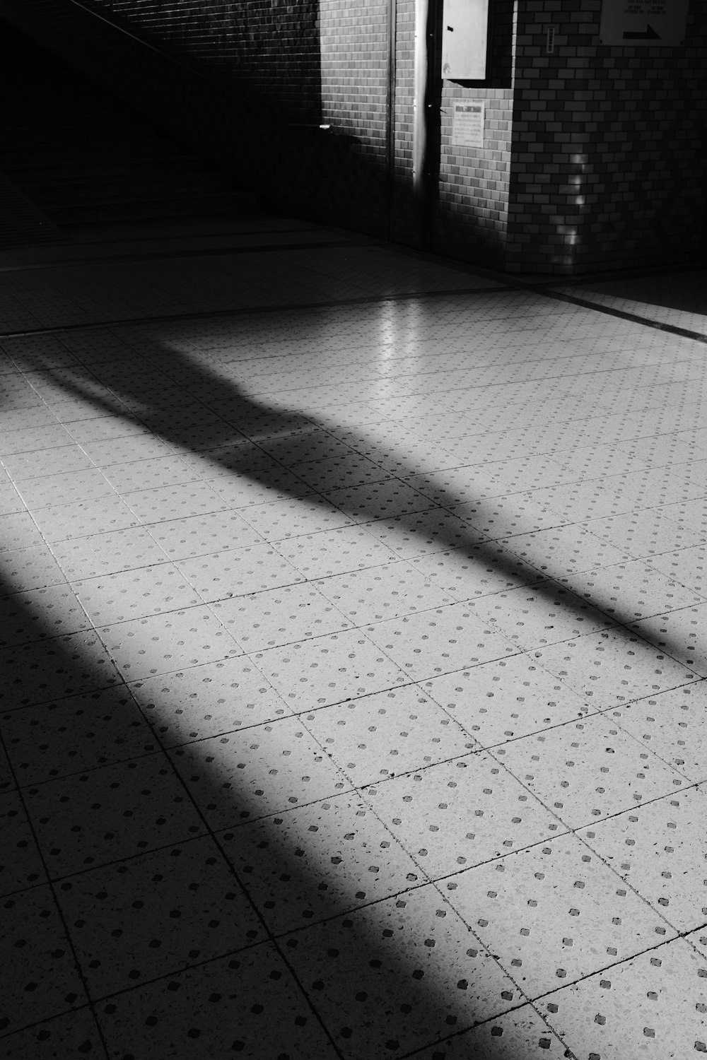 white and black floor tiles