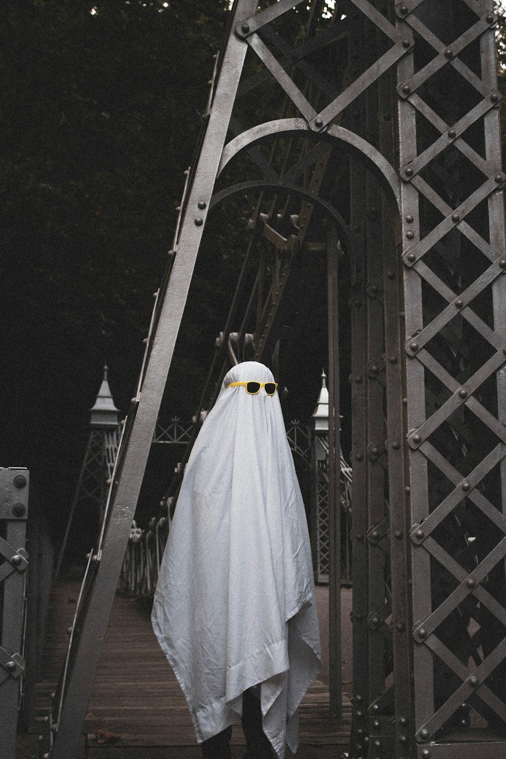 white dress hanged on black metal frame