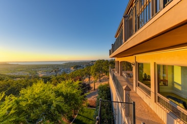 A stunning sunset view from a luxury balcony.