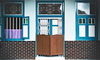 Facade of a traditional Algarve house with fresh paint and restored details