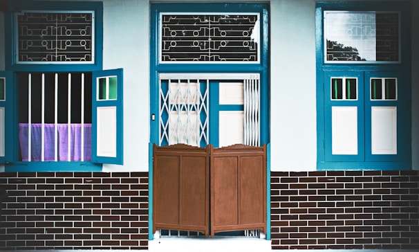 Facade of a traditional Algarve house with fresh paint and restored details