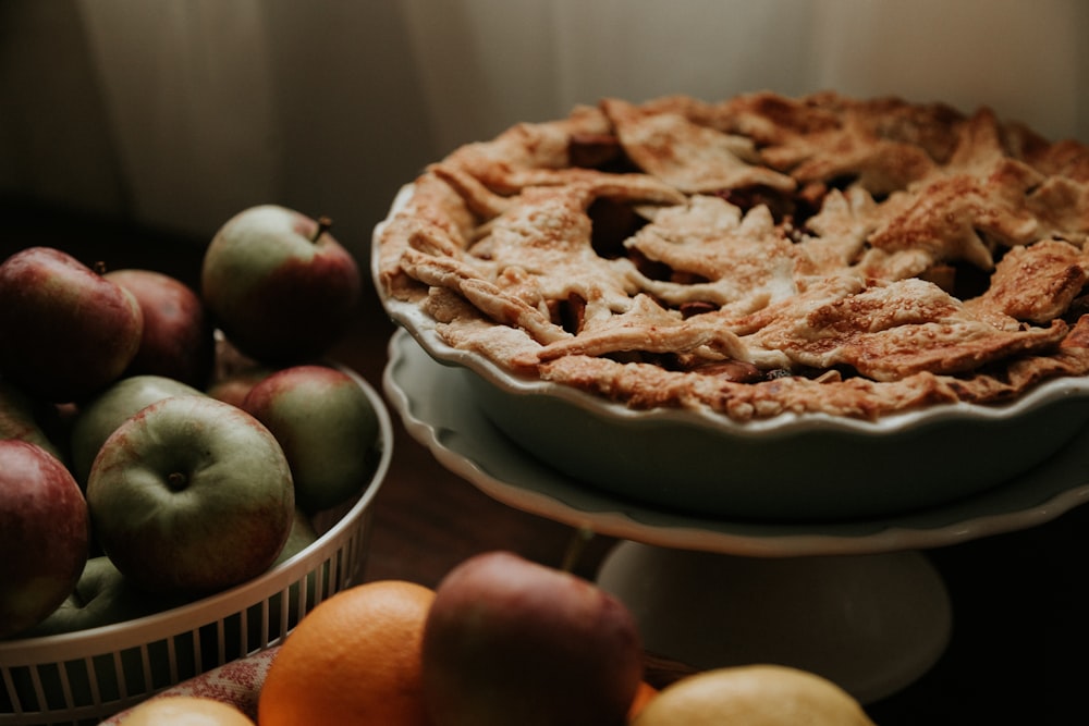 brown pie on white ceramic bowl