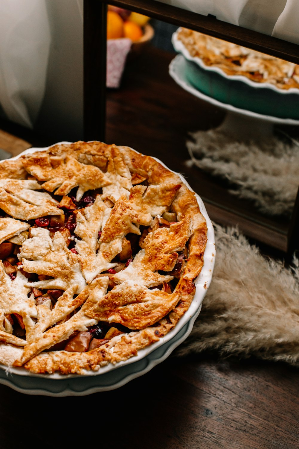 brown pie on white ceramic plate